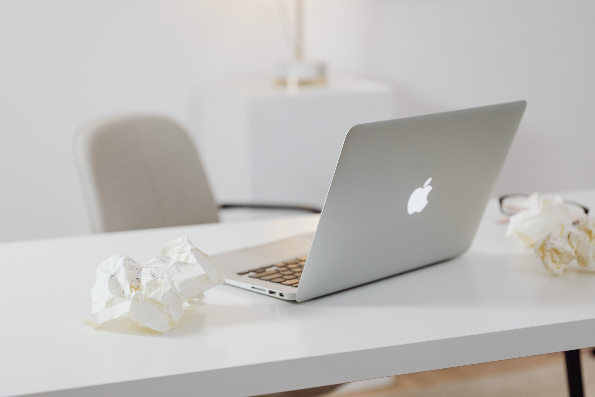 Silver Macbook on White Table